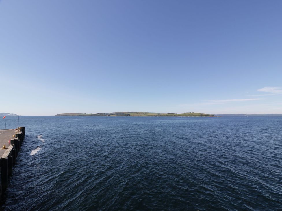 A view of an island from a pier at 6 George Street, Isle of Cumbrae