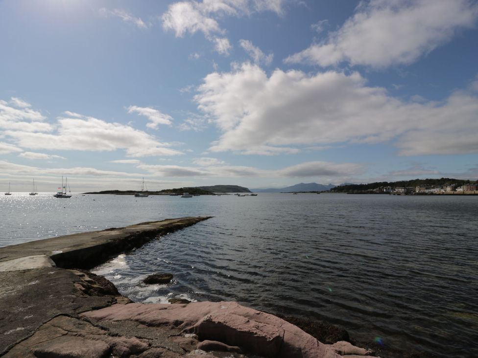 A view of water with boats and clouds at 6 George Street Isle of Cumbrae