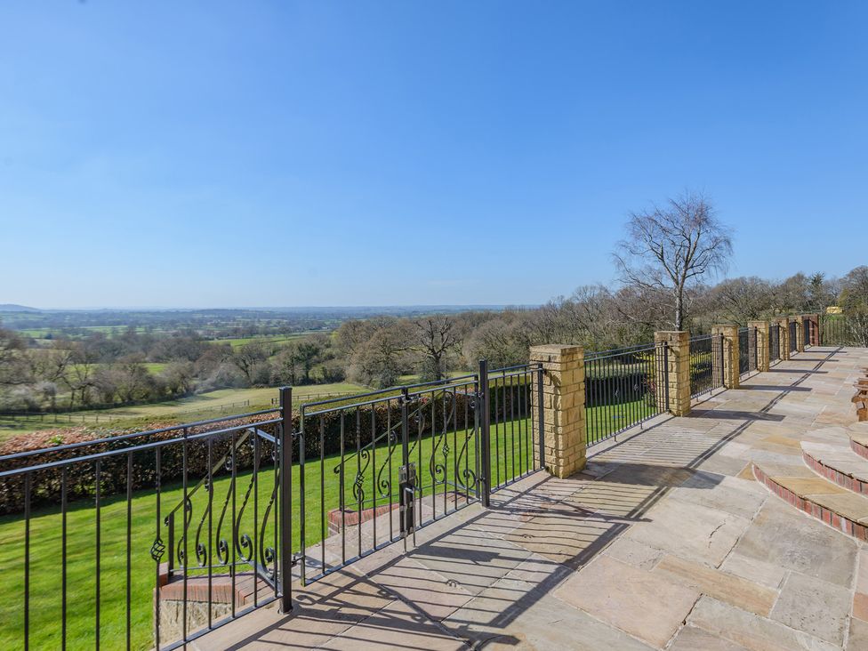 View from a terrace overlooking a landscape at Underhill House