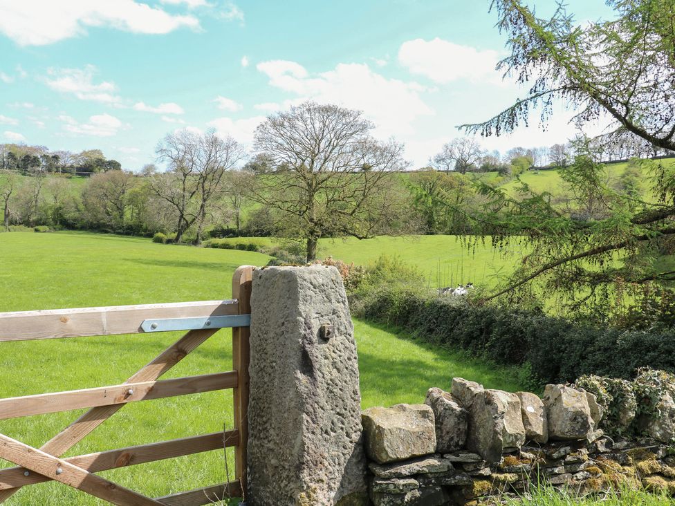 A gate leading to a green field at Carr House Farm in Chesterfield