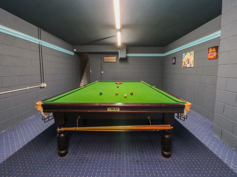 A game room with a snooker table and balls at 11 North Terrace Seaham