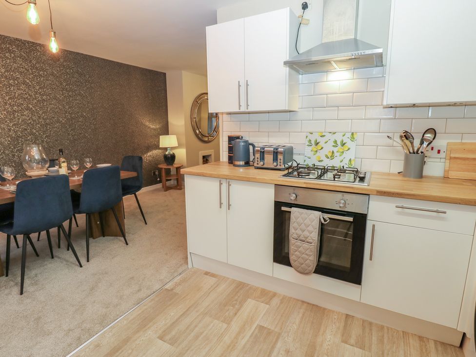 A kitchen with dining area at Eleven Tides in Seaham
