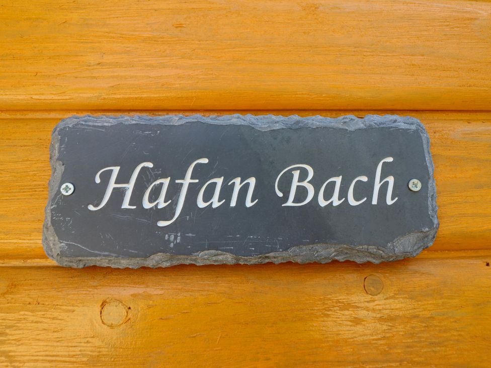A sign displaying 'Hafan Bach' at Haven in Lloc near Holywell