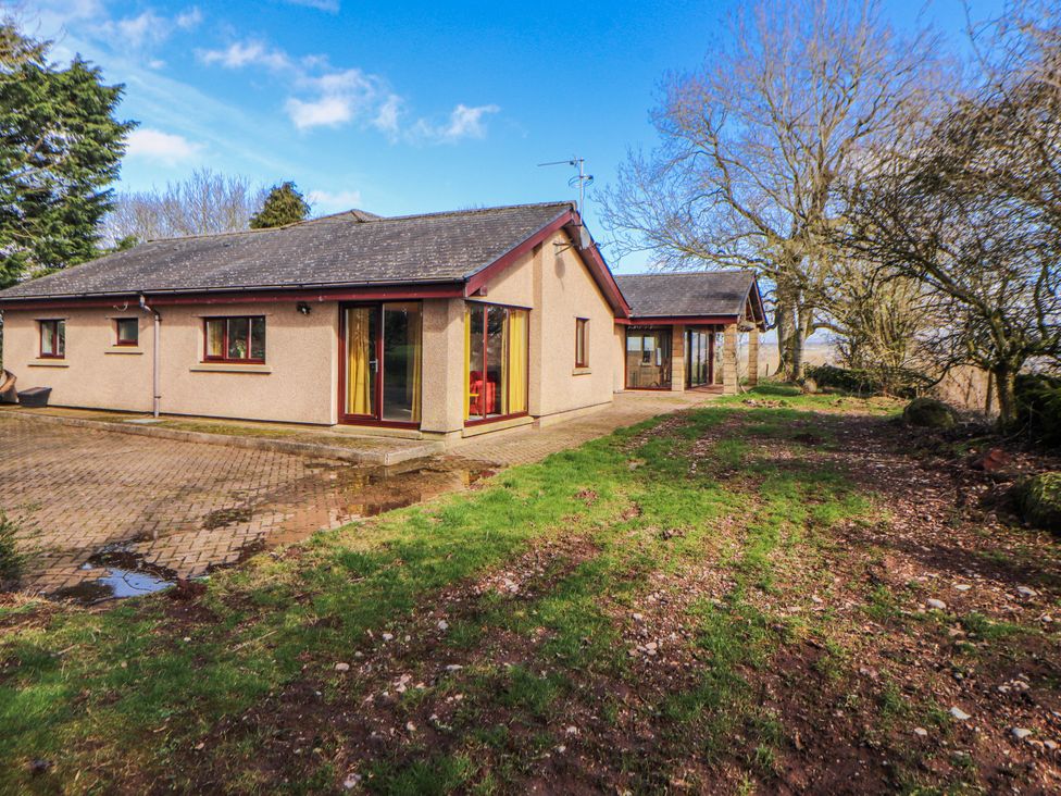 A house with patio and trees at Old Riggs Paddock, Penrith