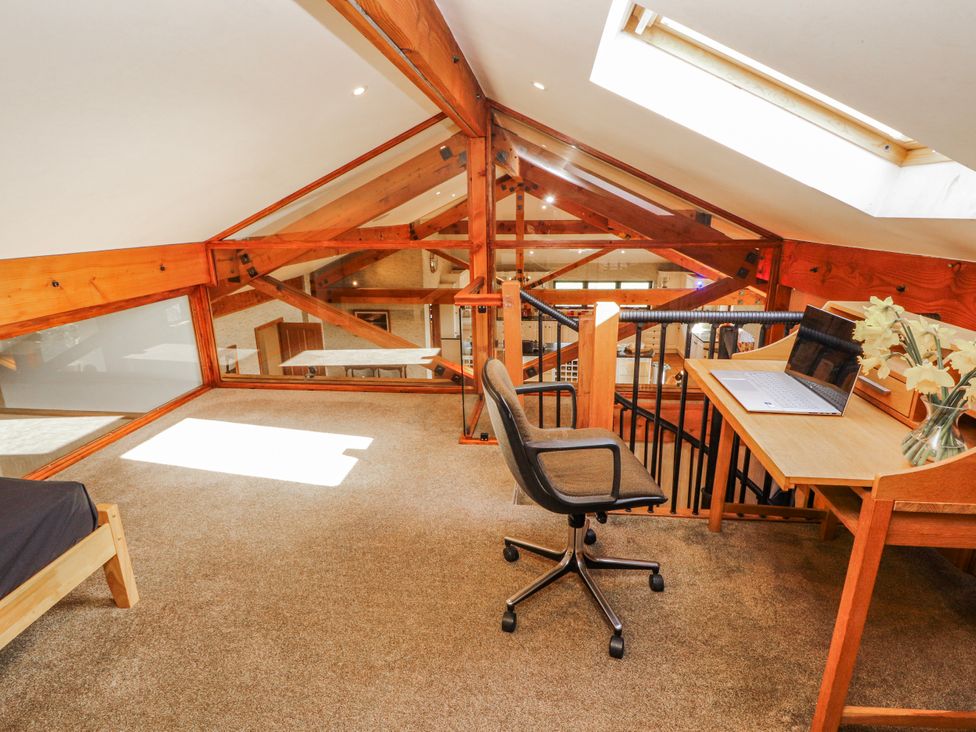 An office space with a desk and laptop at Old Riggs Paddock in Penrith