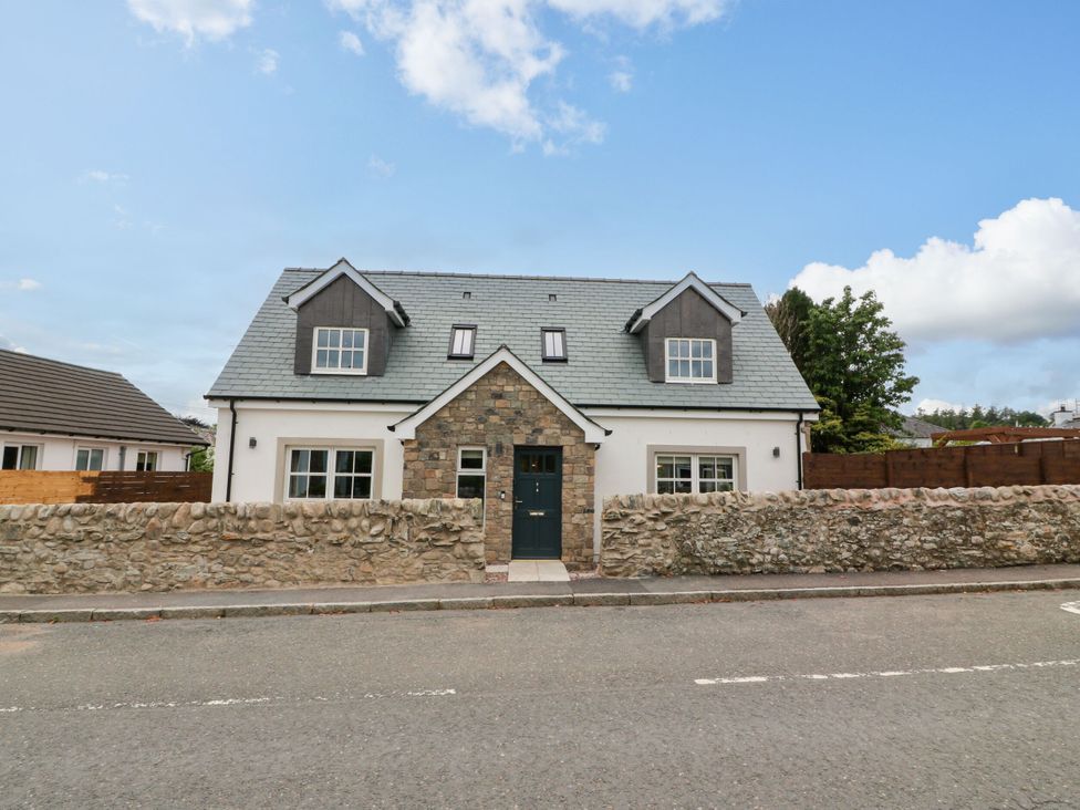 A house with stone and wood features at Riverwood House in Gatehouse Of Fleet