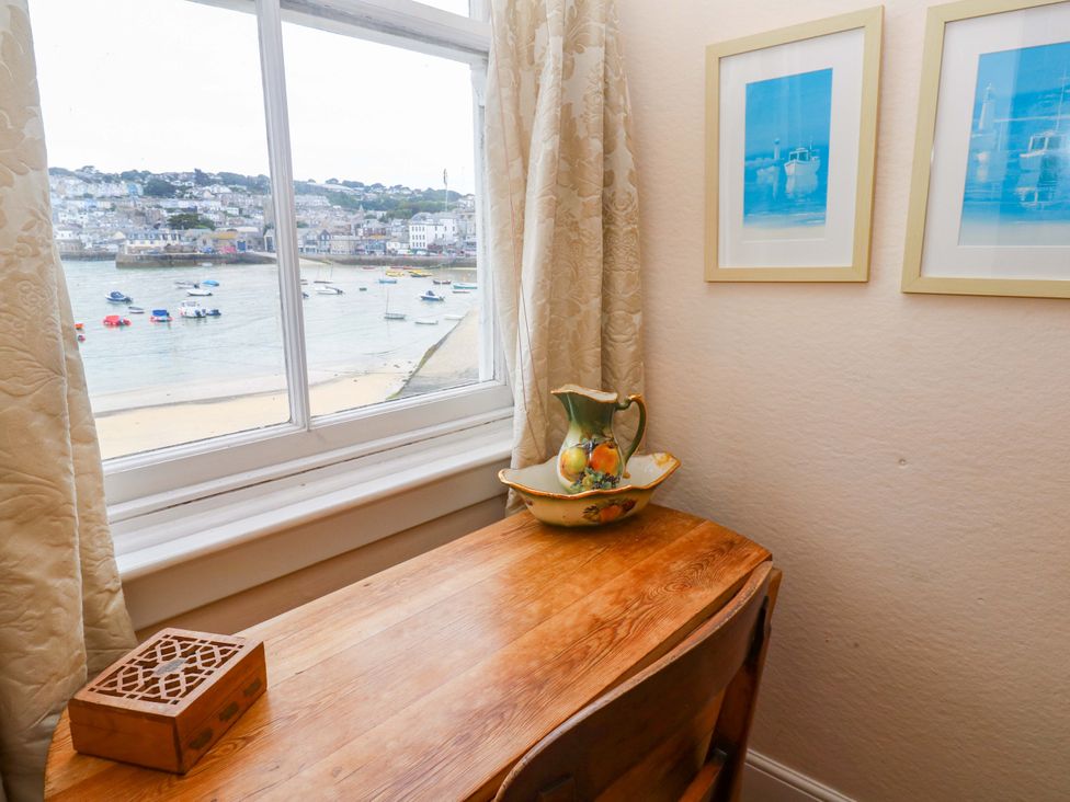 A workspace with a view of the sea at Pelican Cottage in St Ives