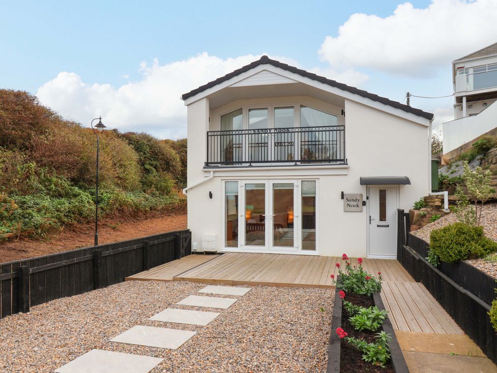 A house with a deck and balcony at Sandy Nook in Redcar