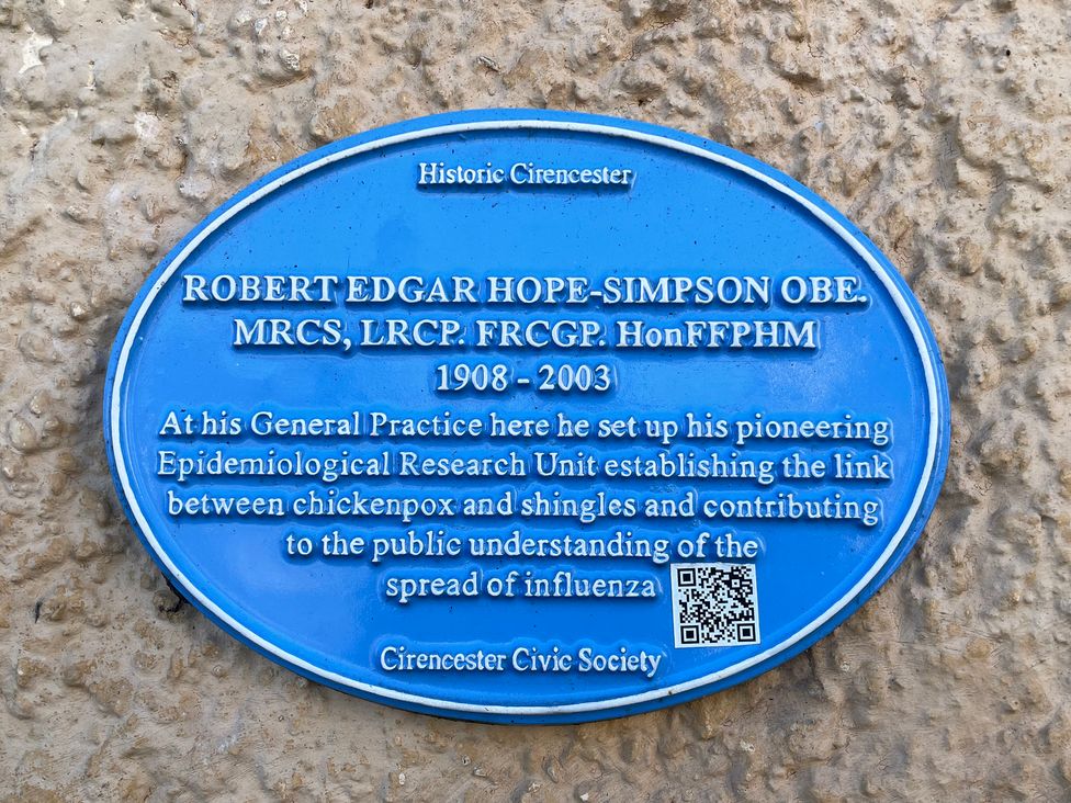 A blue plaque honoring Robert Edgar Hope-Simpson at Cirencester