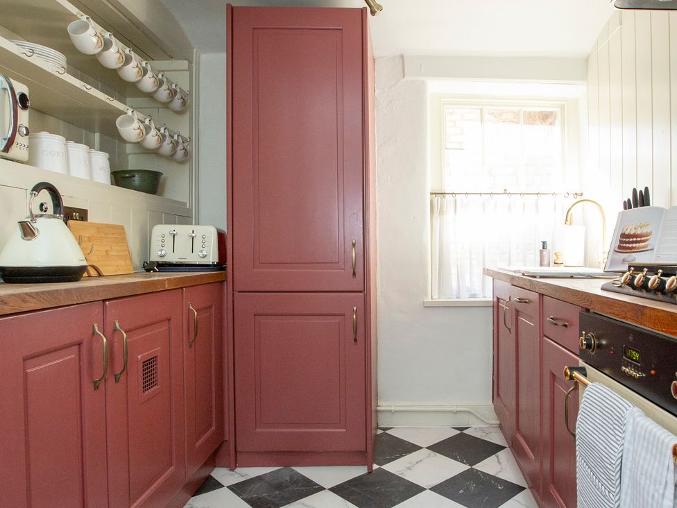 A kitchen with a kettle and toaster at Apartment 2, 86 Dyer Street Cirencester