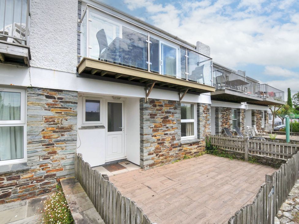 An outdoor area with a patio and entrance at 9 Slipway Cottages Rock