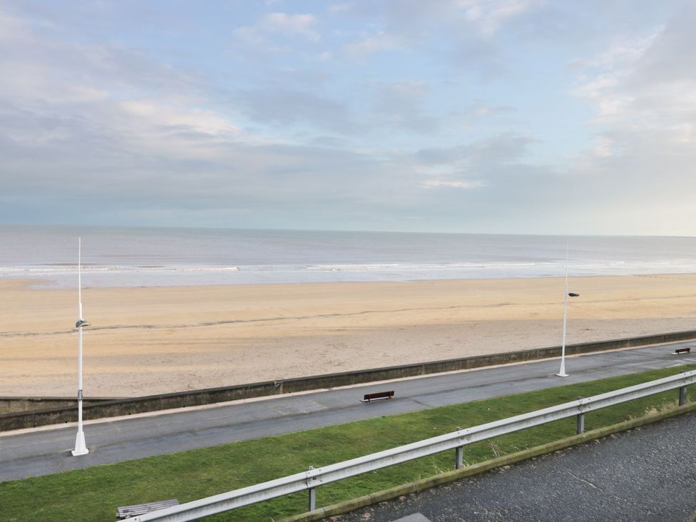 A beach view with ocean and sky at Sandy Shore in Bridlington