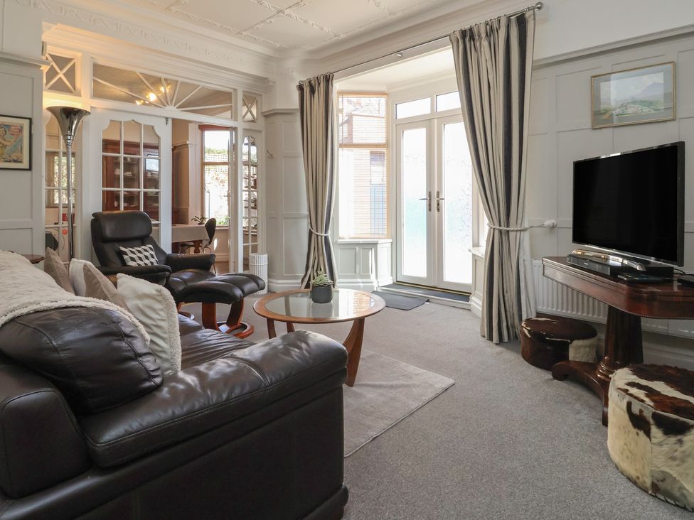 A living room with a sofa and coffee table at Sandy Shore in Bridlington
