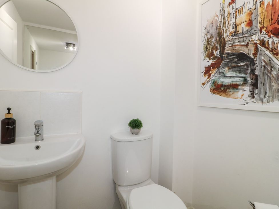 A bathroom with a sink and toilet at 7 Yarnfield Parkway
