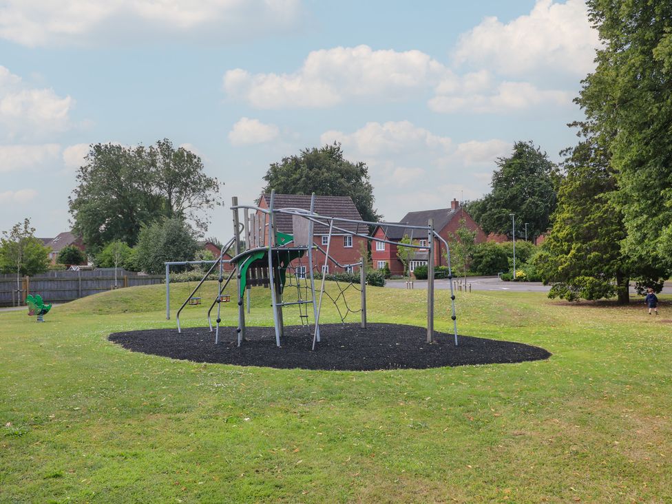 A playground with a climbing frame in a park at 7 Yarnfield Parkway