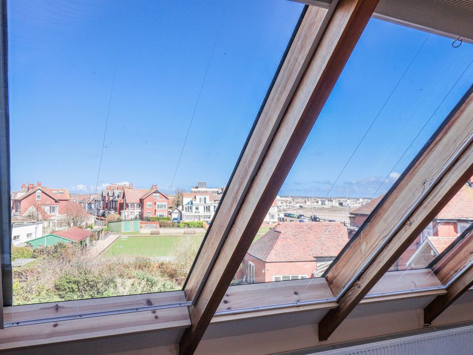 A view from a window showing houses and gardens at Atelier in Bridlington