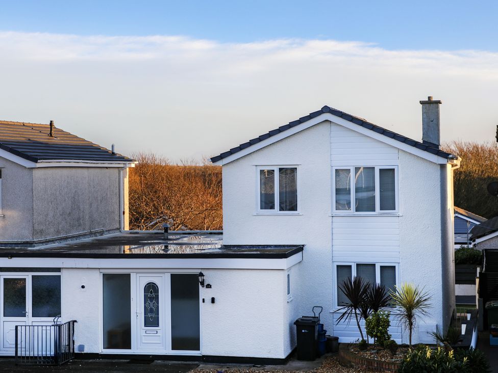 A house with windows and a garden at Penrhos Walks in Holyhead