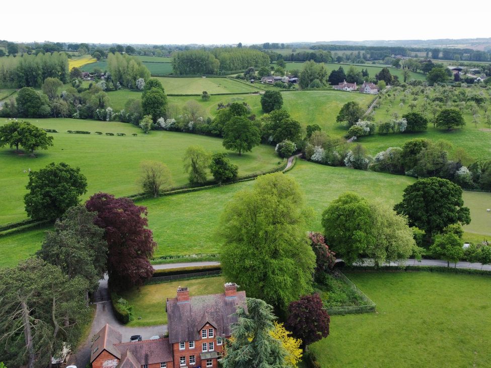A landscape view with fields and trees at The Old Vicarage