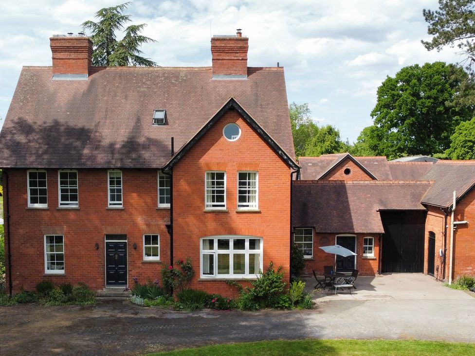 A house with a garage and garden at The Old Vicarage in Kimbolton near Leominster