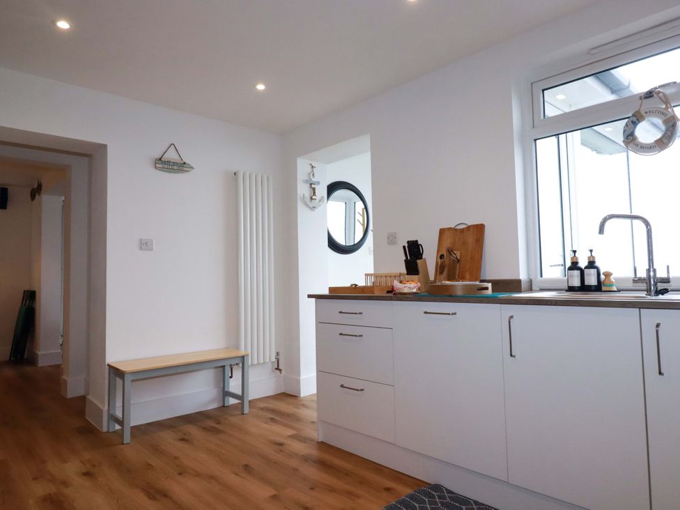 A kitchen with a countertop and sink at Ocean Edge in Sennen Cove