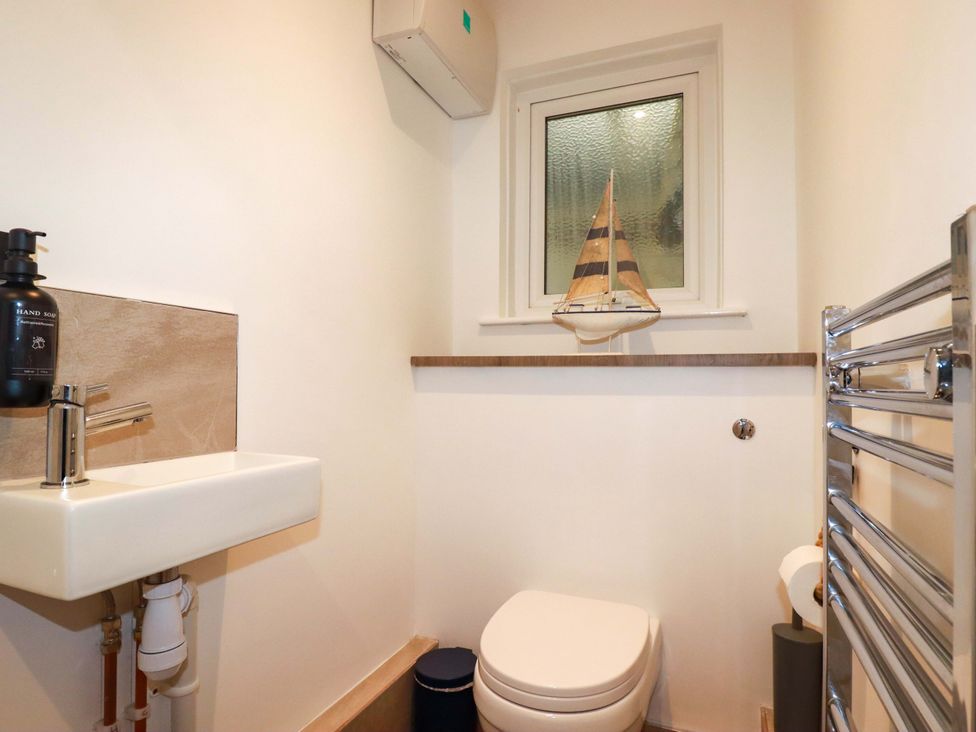 A bathroom with sink and toilet at Ocean Edge in Sennen Cove