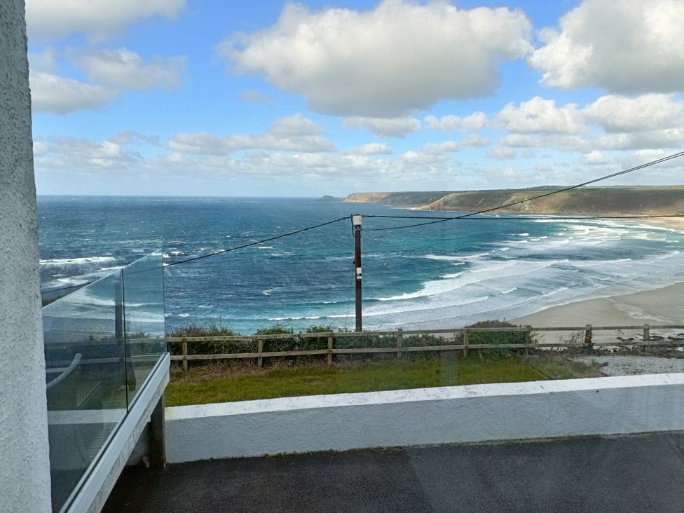 A view of the ocean with waves at Ocean Edge in Sennen Cove