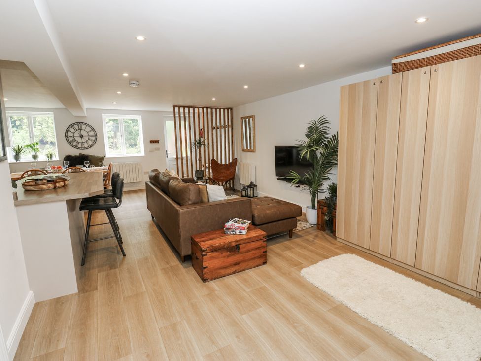 A living room with a sofa and coffee table at Apartment 5 in Skipton