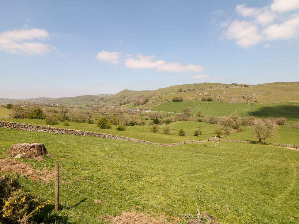 Landscape with fields and trees in a rural area at The Lodge in Wirksworth
