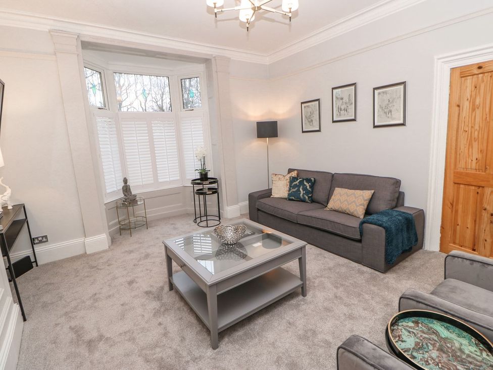A living room with a sofa and coffee table at 16 Seafield Terrace South Shields