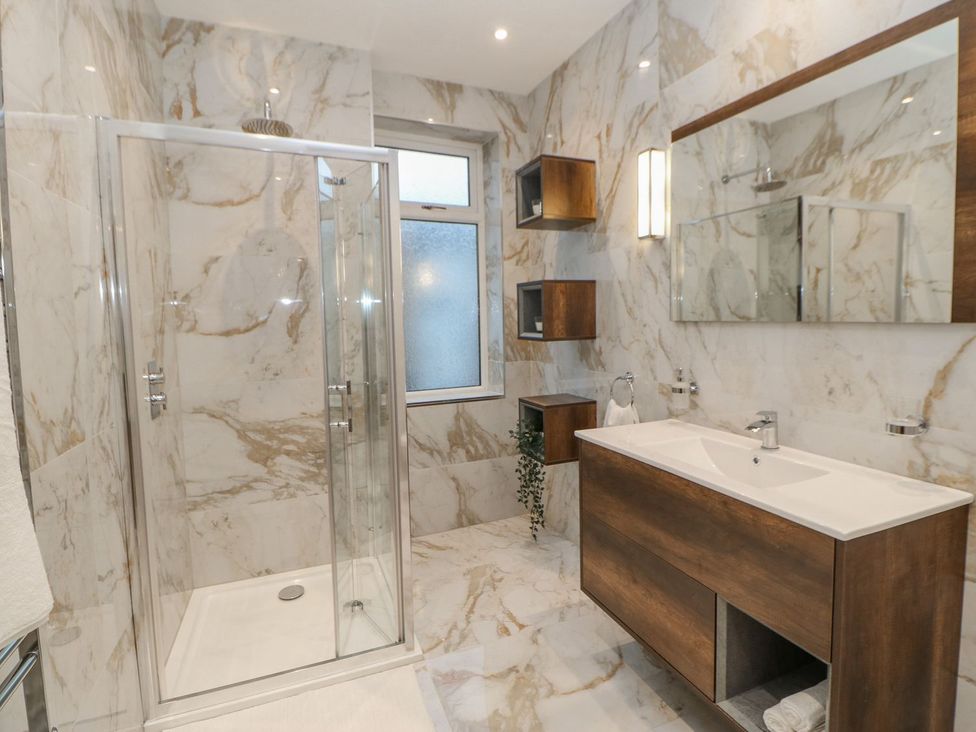 A bathroom featuring a shower and sink at 16 Seafield Terrace South Shields