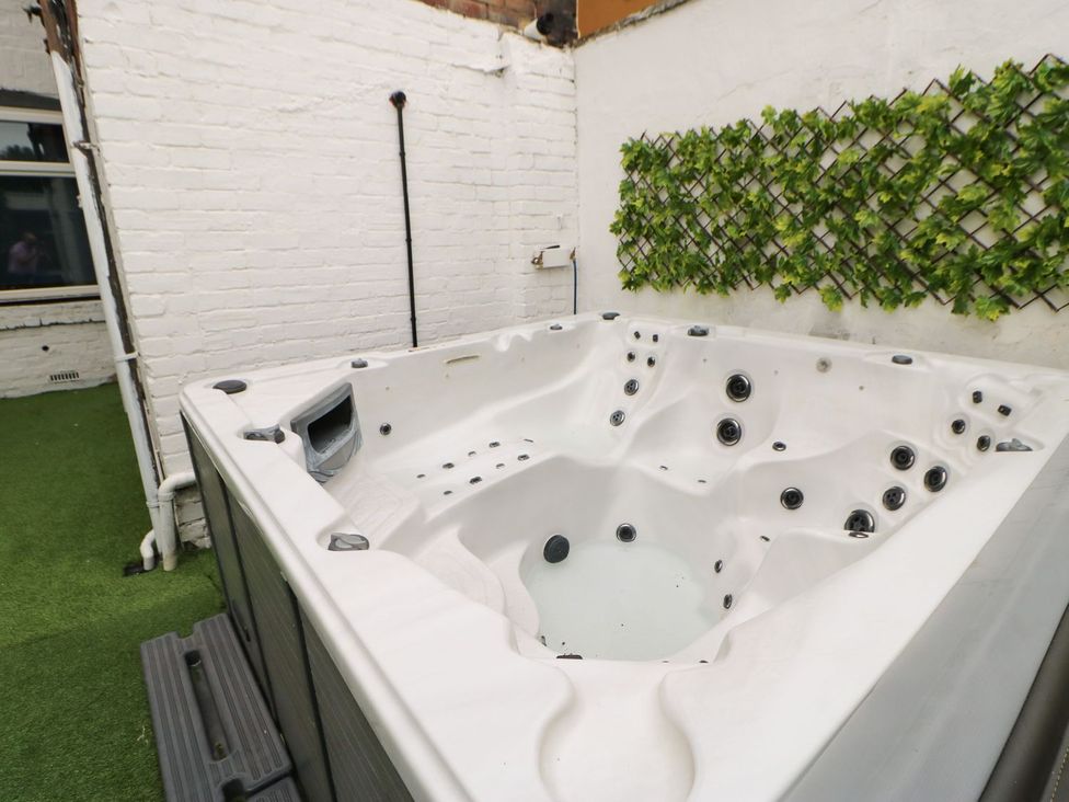 A hot tub in an outdoor area at 16 Seafield Terrace South Shields