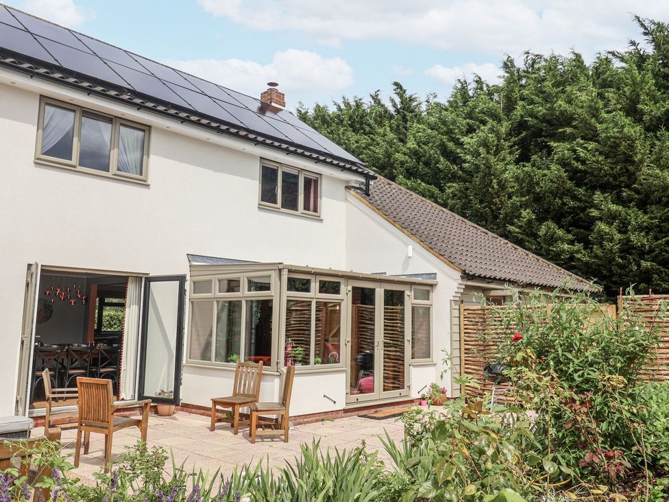 A house with solar panels and garden at Holly Farm near Brantham