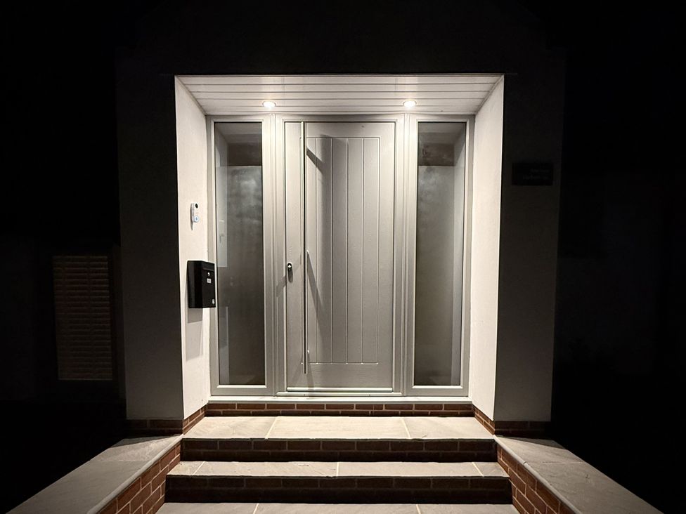 An entrance with a front door and mailbox at Bader House in Ipswich