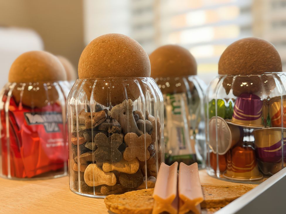 A selection of snacks and dog treats in glass jars at Gardener's Cottage in Lytham St. Annes