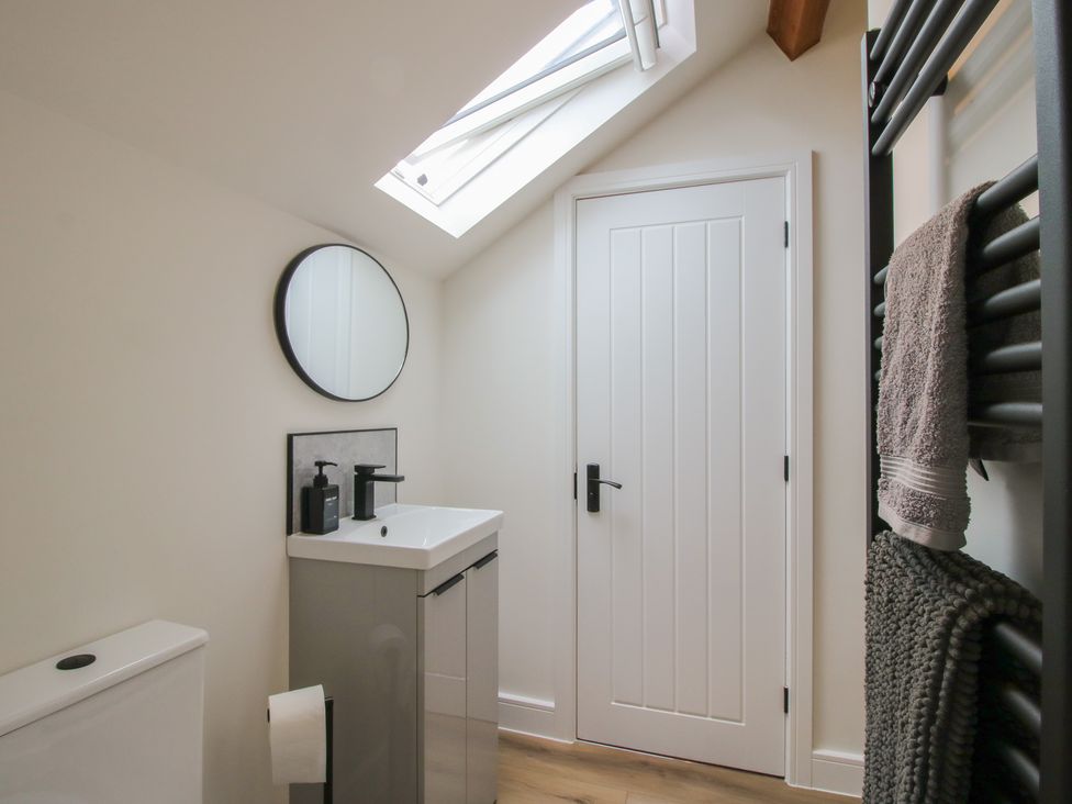 A bathroom with a sink and toilet at Ash Barn Northwood near Wem