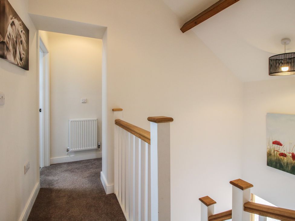 A staircase and hallway at Willow Barn Northwood near Wem