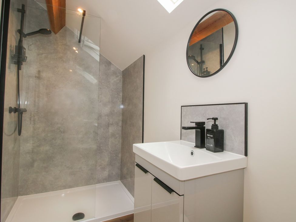 A bathroom with a shower and sink at Willow Barn Northwood near Wem