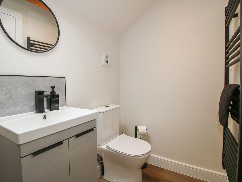 A bathroom with a sink and toilet at Willow Barn Northwood near Wem