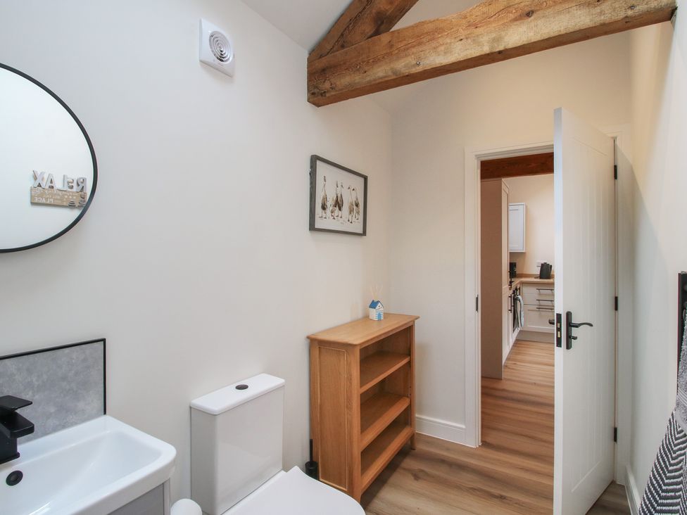 A bathroom with a sink and toilet at Elm Barn Northwood near Wem