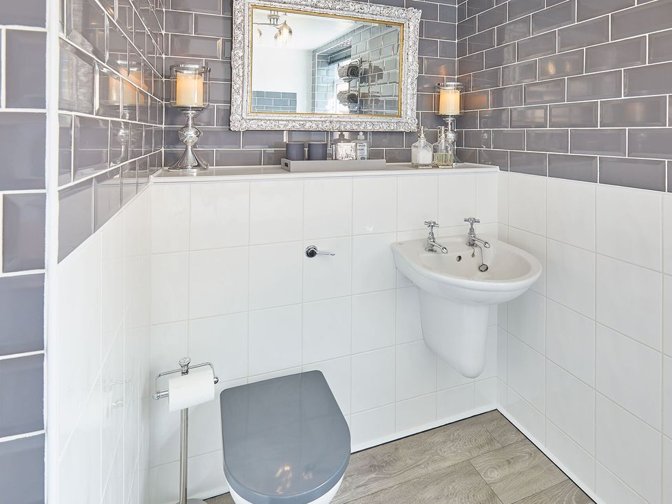 A bathroom with a toilet and bidet at Apartment 2 Whitby