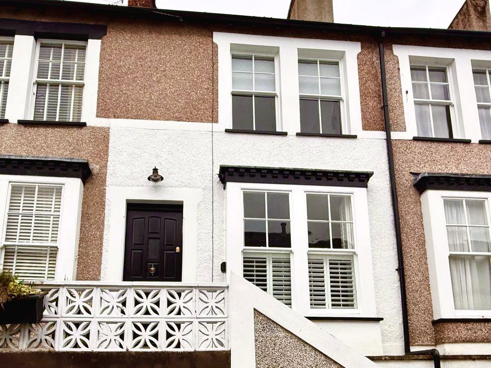 A house with a front door and windows in Conwy