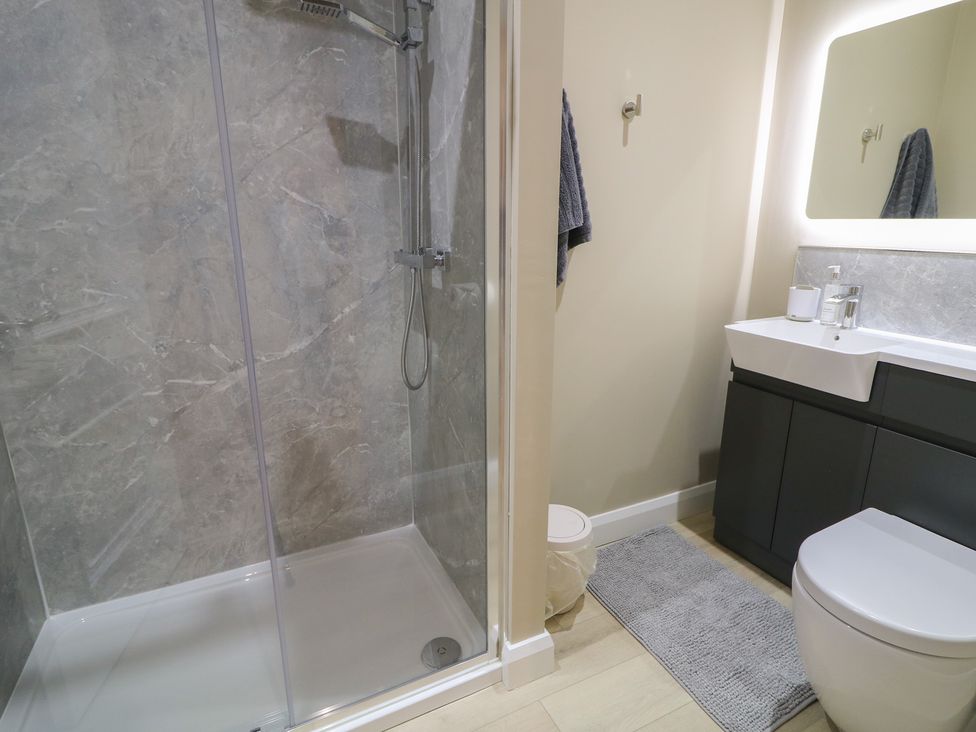 A bathroom with a shower and toilet at Clarmes House Limavady