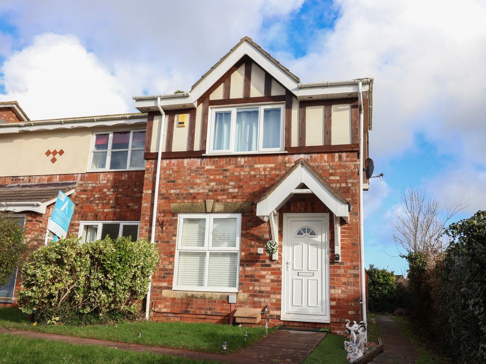 A house with a front door and window at The Cosy View in Paignton