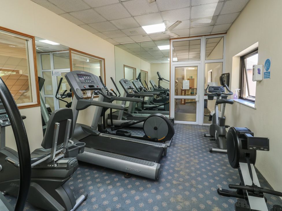 A gym with various exercise equipment at Swift Newton Abbot