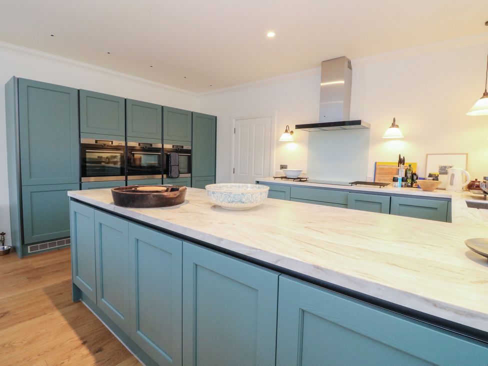 A kitchen with cabinets and ovens at Schiehallion House in Pitlochry