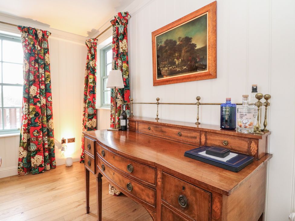 An office with a desk and lamp at Schiehallion House in Pitlochry