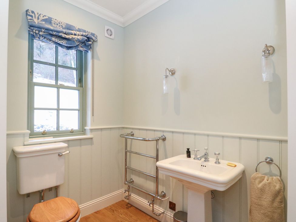 A bathroom with a sink and toilet at Schiehallion House in Pitlochry