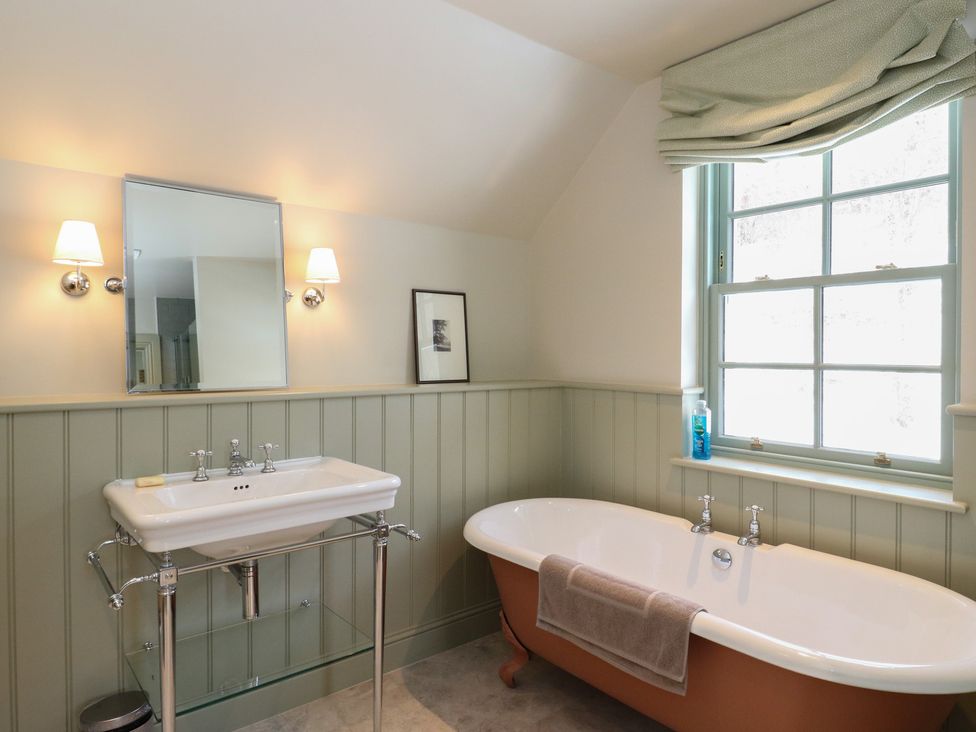 A bathroom with a sink and bathtub at Schiehallion House in Pitlochry