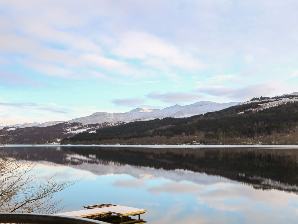 A view of a lake surrounded by mountains at Schiehallion House in Pitlochry