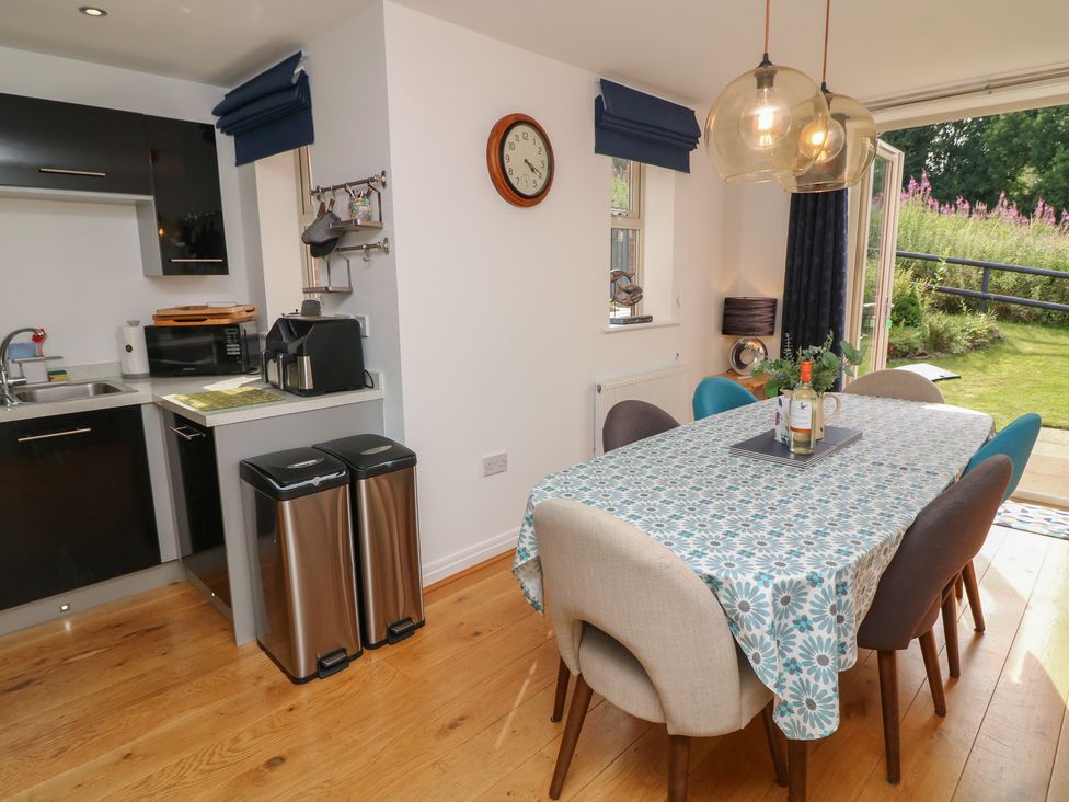 A dining room with a table and chairs at No 39 in Ashbourne
